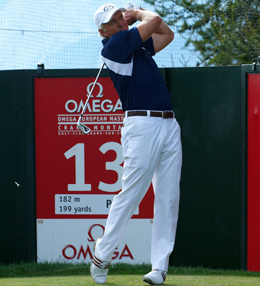 Norman slaat af op de 13de hole